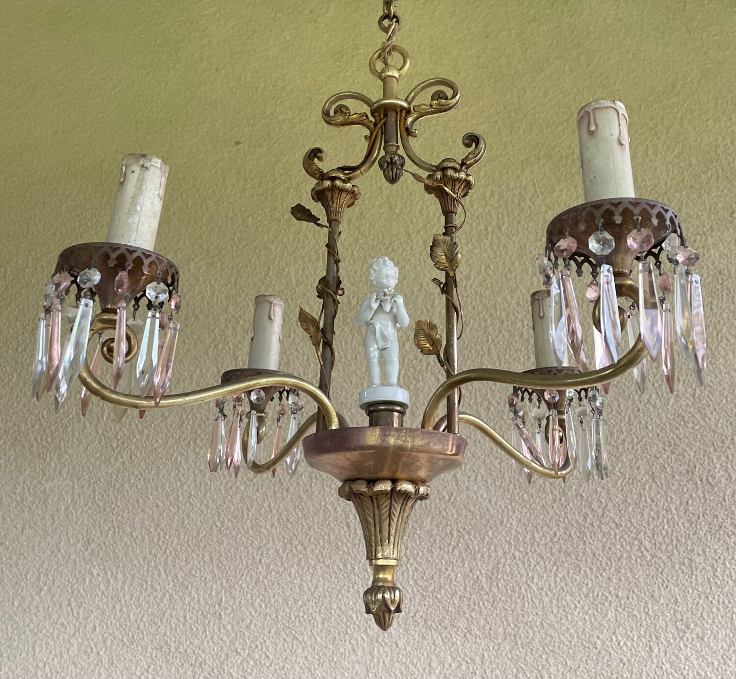 Antique bronze chandelier with porcelain angel.