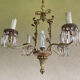 Lustre ancien en bronze italien avec ange en porcelaine.