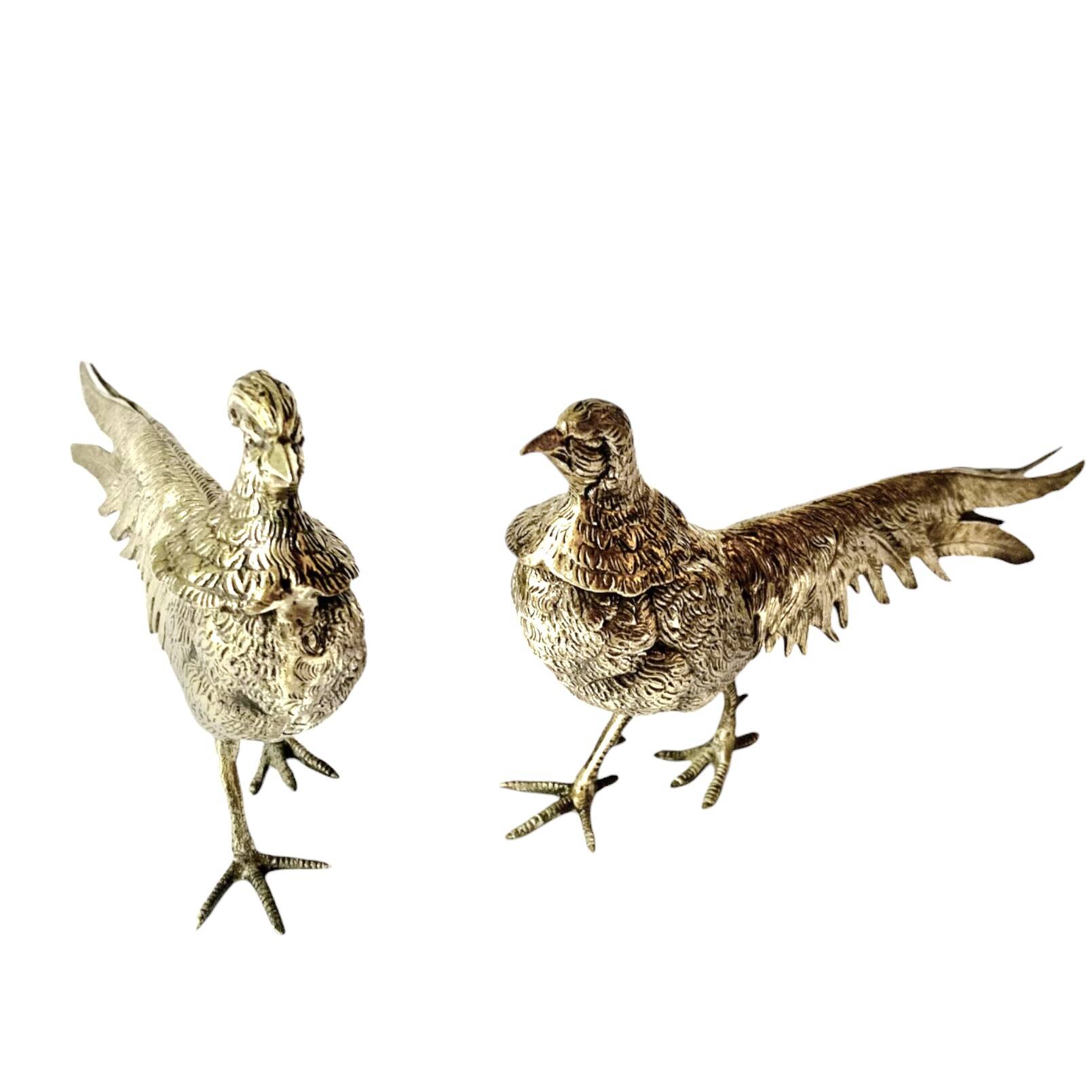 Couple de faisans décoratifs en métal argenté