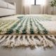 Handwoven natural wool rug 150/250 cm