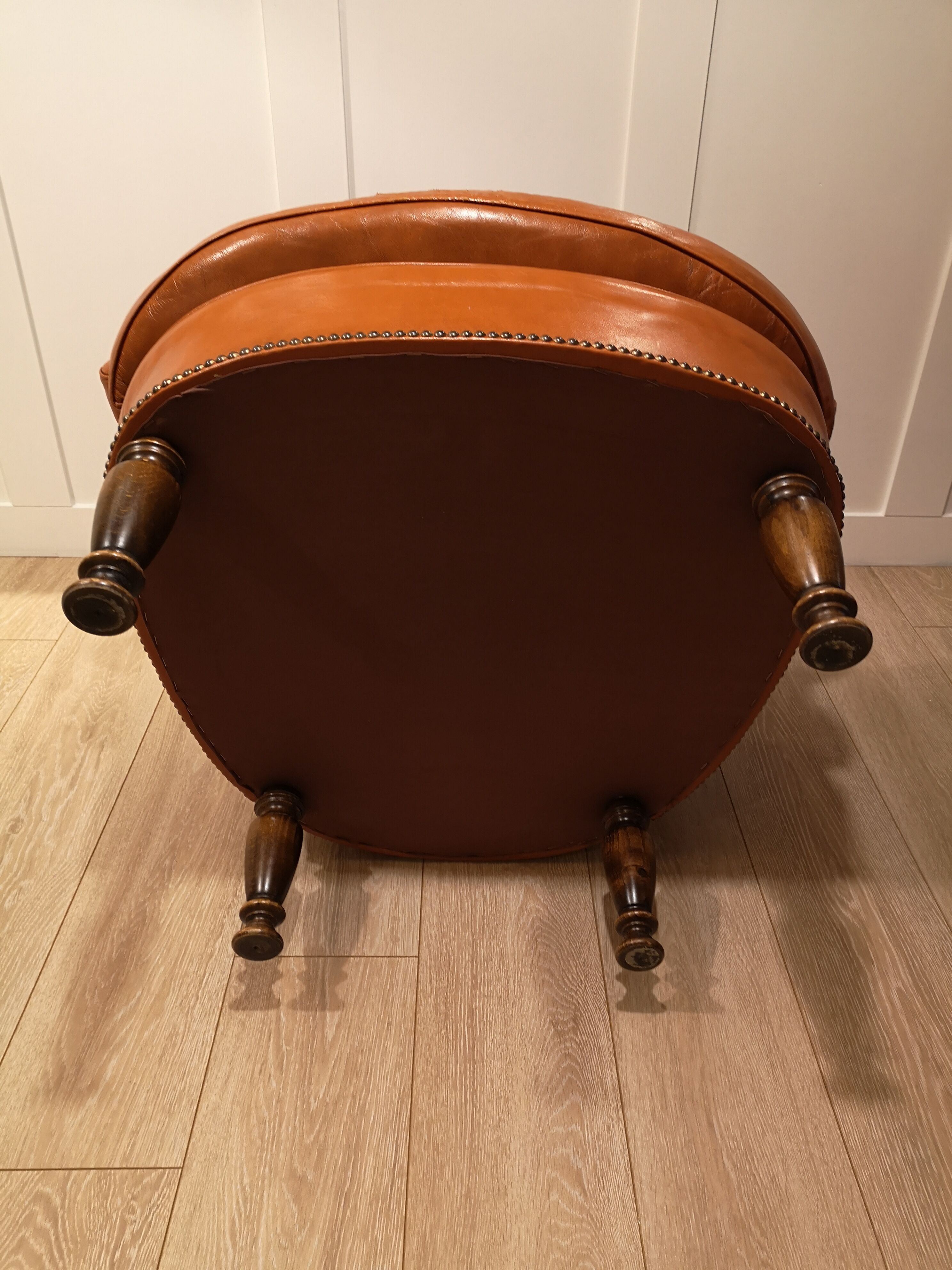 Pair of leather chesterfield chairs