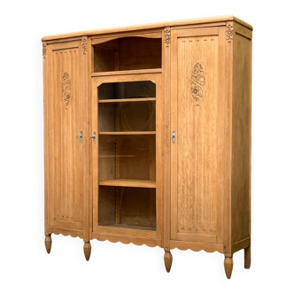 Parisian Art Deco asymmetrical glass cabinet in raw oak, 1930