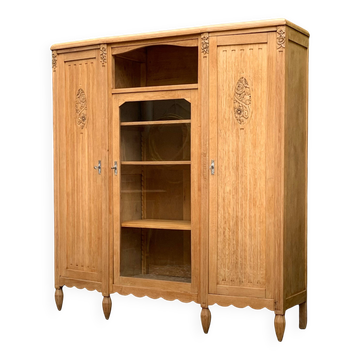 Asymmetrical Art Deco glass-fronted Parisian wardrobe in raw oak, 1930.