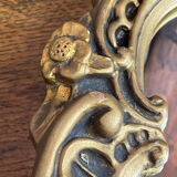 Miroir en bois et plâtre doré