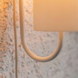 Pair of wall sconces by Louis Kalff