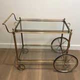 Neoclassical style rolling table in silvered brass