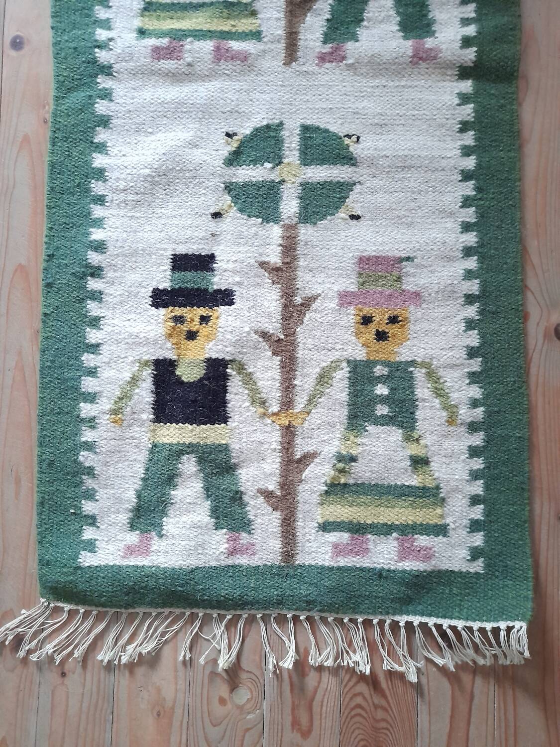 Small wool rug with a 70s Danish folk pattern.