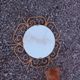 Golden metal sun mirror from the 1950s.