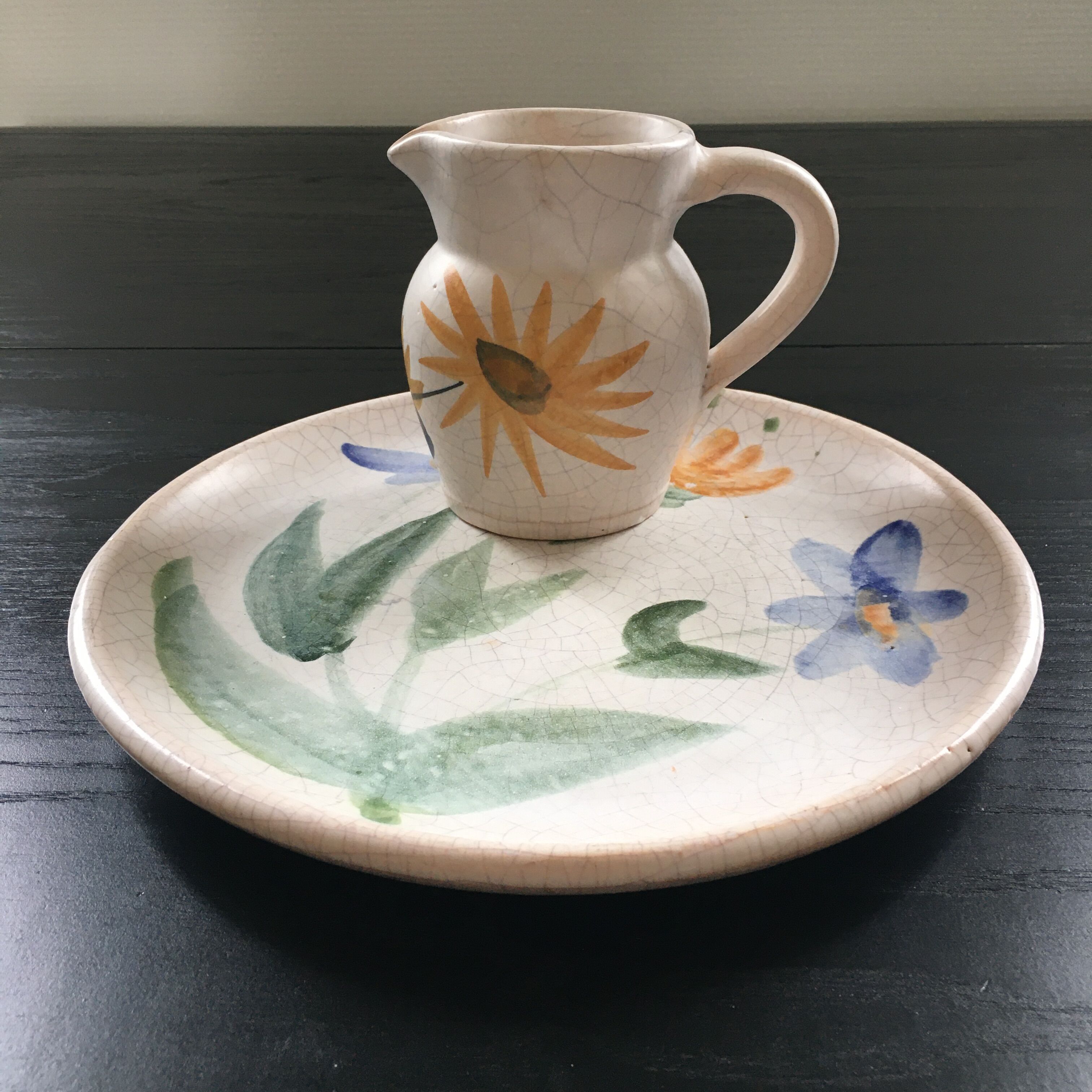 Set plate and jug with floral decoration.