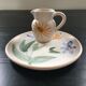 Set plate and jug with floral decoration.