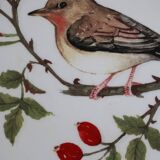 Cake display on pedestal with bird decor