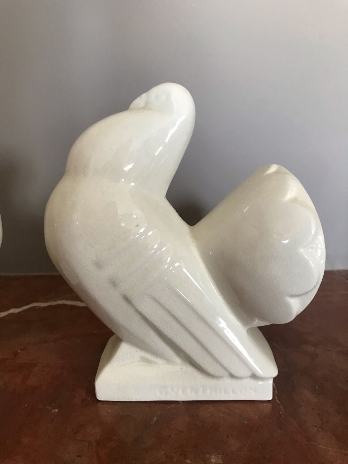 Pair of bookends in ceramic art deco cracked pigeons signed