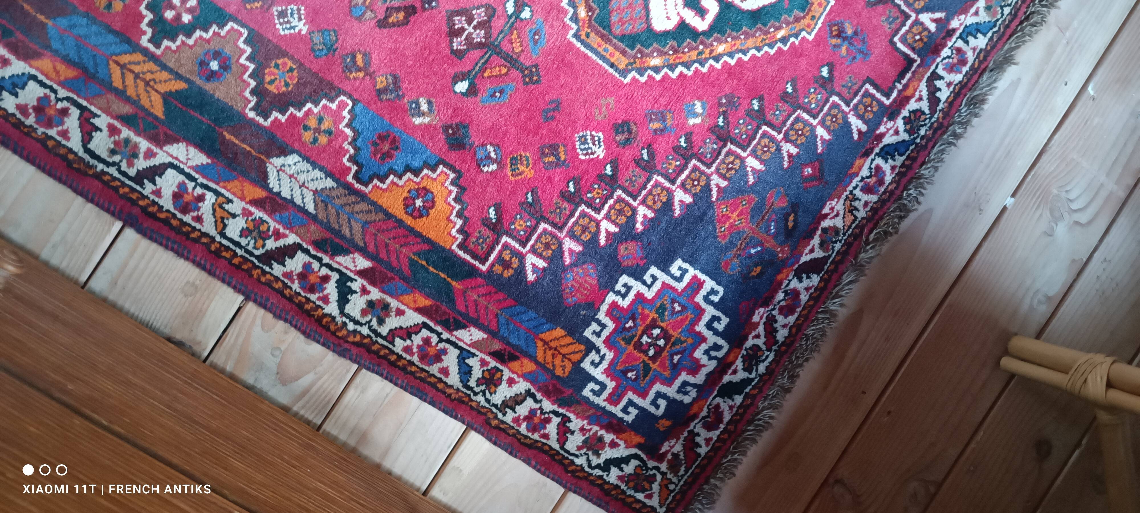 Vintage Iranian rug from the 1950s. Handcrafted, handmade.