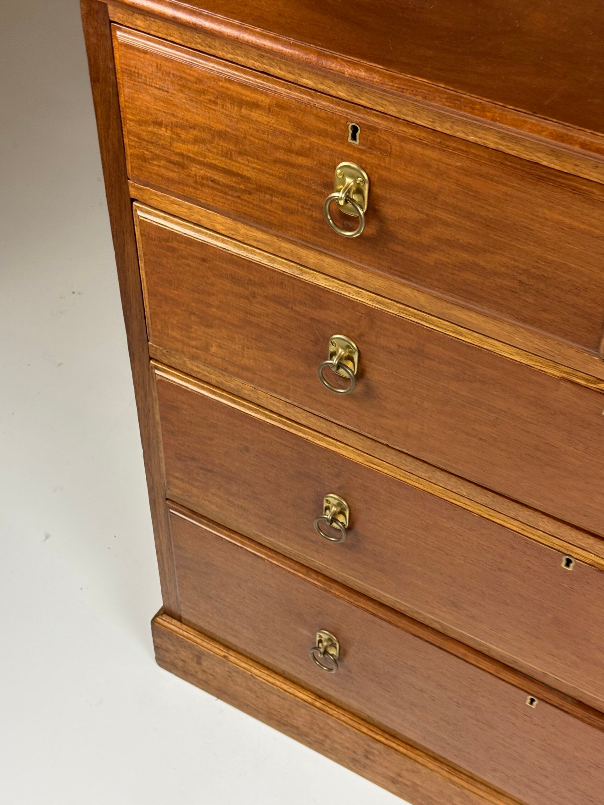 Harrods mahogany chest of drawers