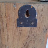 Old temple-showcase with teak offerings