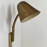 Double orientable vintage patinated brass wall light, Jacques Biny France 1950.