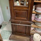 Old wall-mounted mantle-holder cloakroom in see