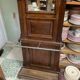Old wall-mounted mantle-holder cloakroom in see