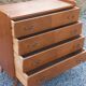Commode vintage en chêne blond pieds compas 4 tiroirs 1950