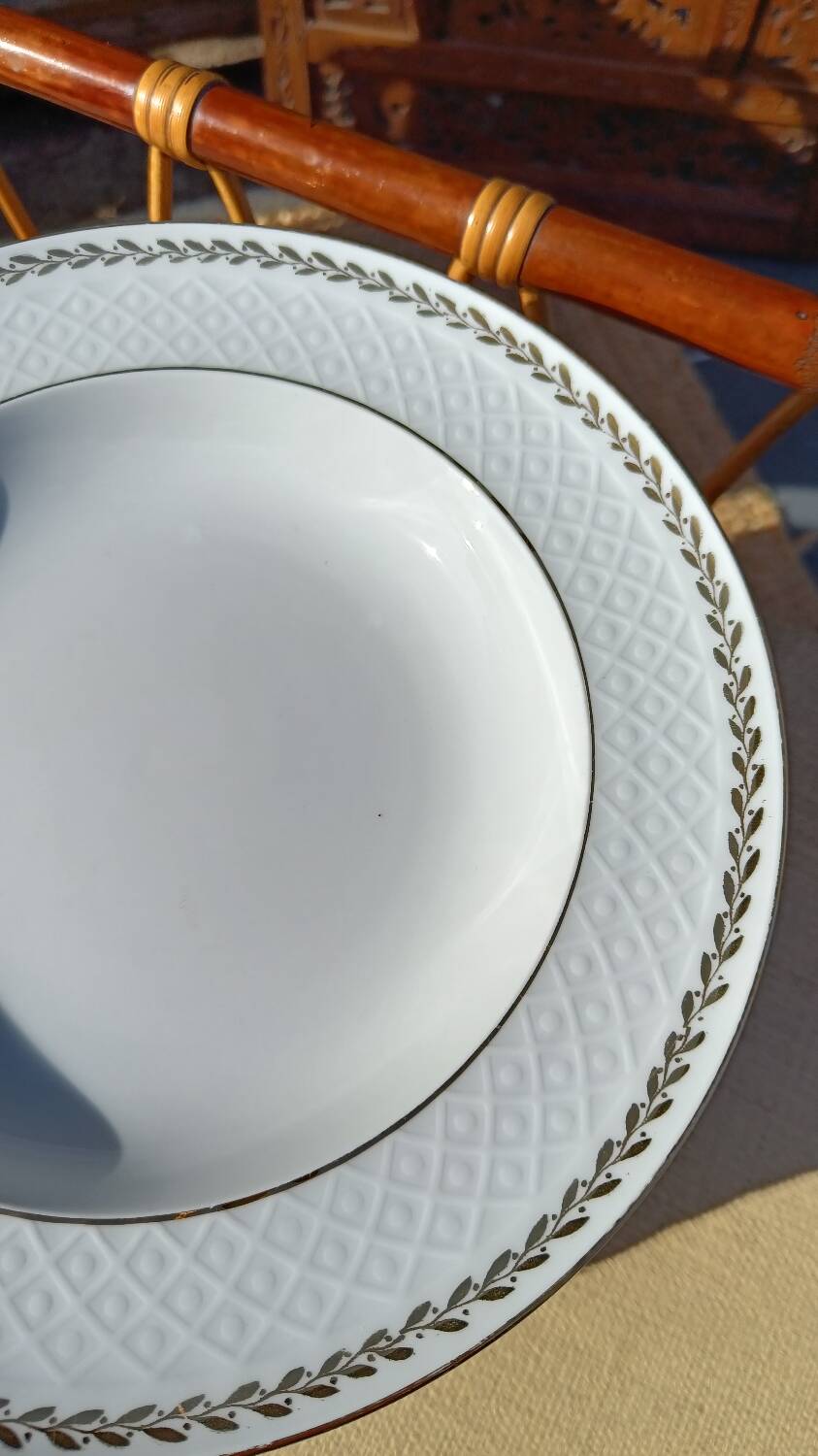 Twelve white porcelain plates