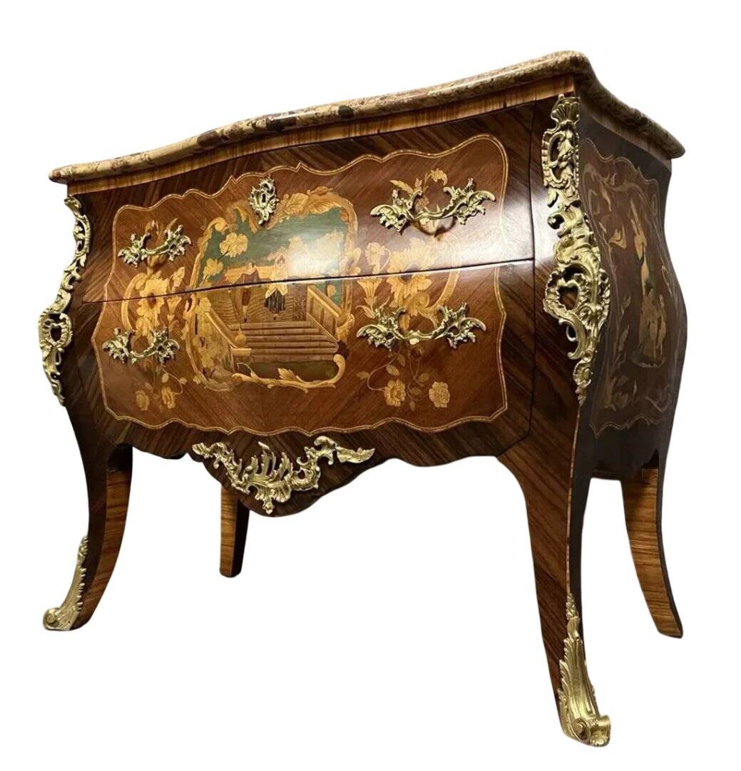 Commode sauteuse galbée style Louis XV estampillée en marqueterie