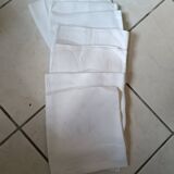 8 Damask napkins. Hand embroidered initials. LR.