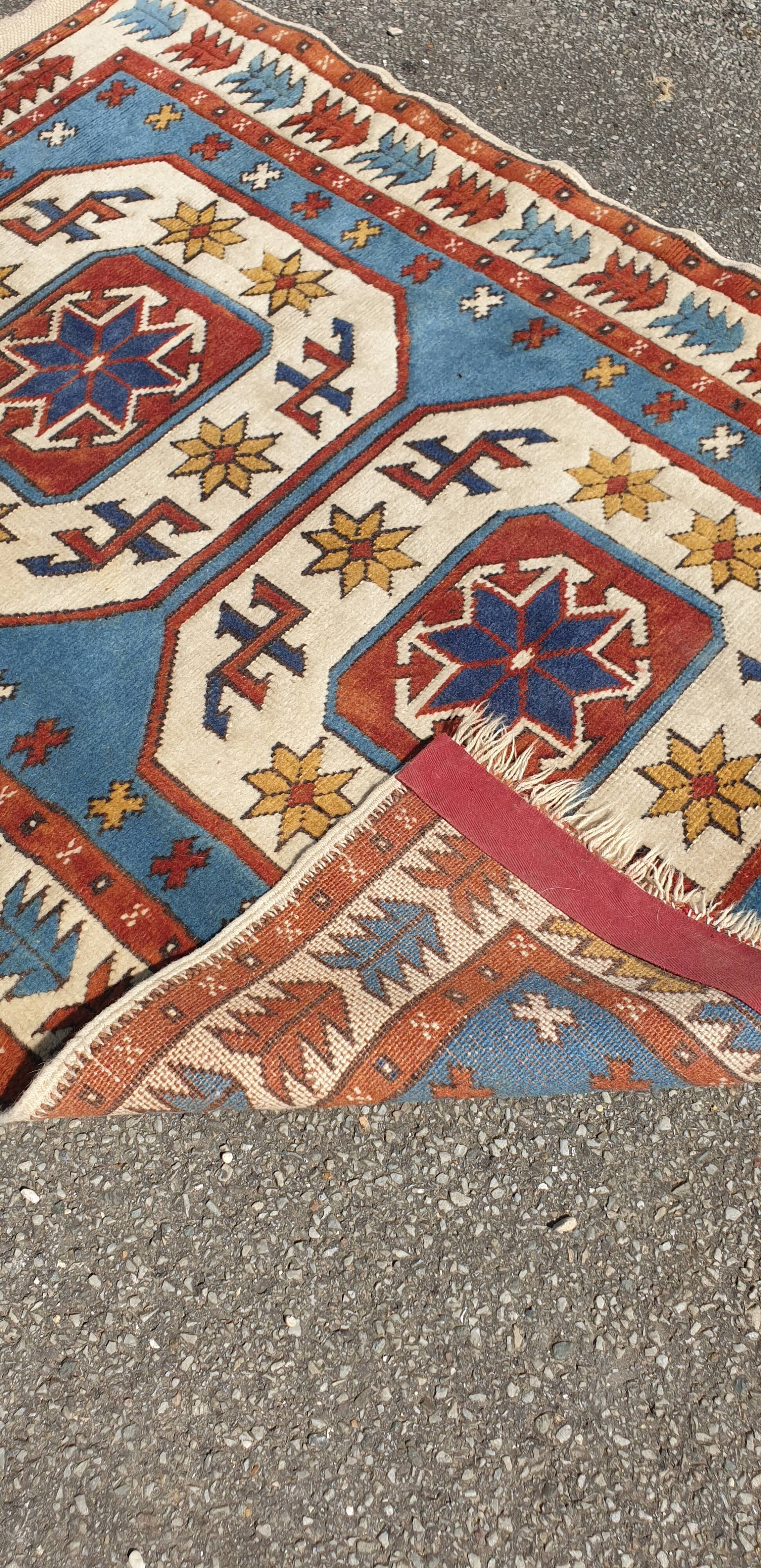 Wool oriental carpet 130x98cm