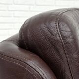 1970s, set of two swivel lounge chairs with footstool, leather.
