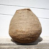 Old basket, burgundy straw and bramble, woven basket, interior decoration, pantry, flowerpot