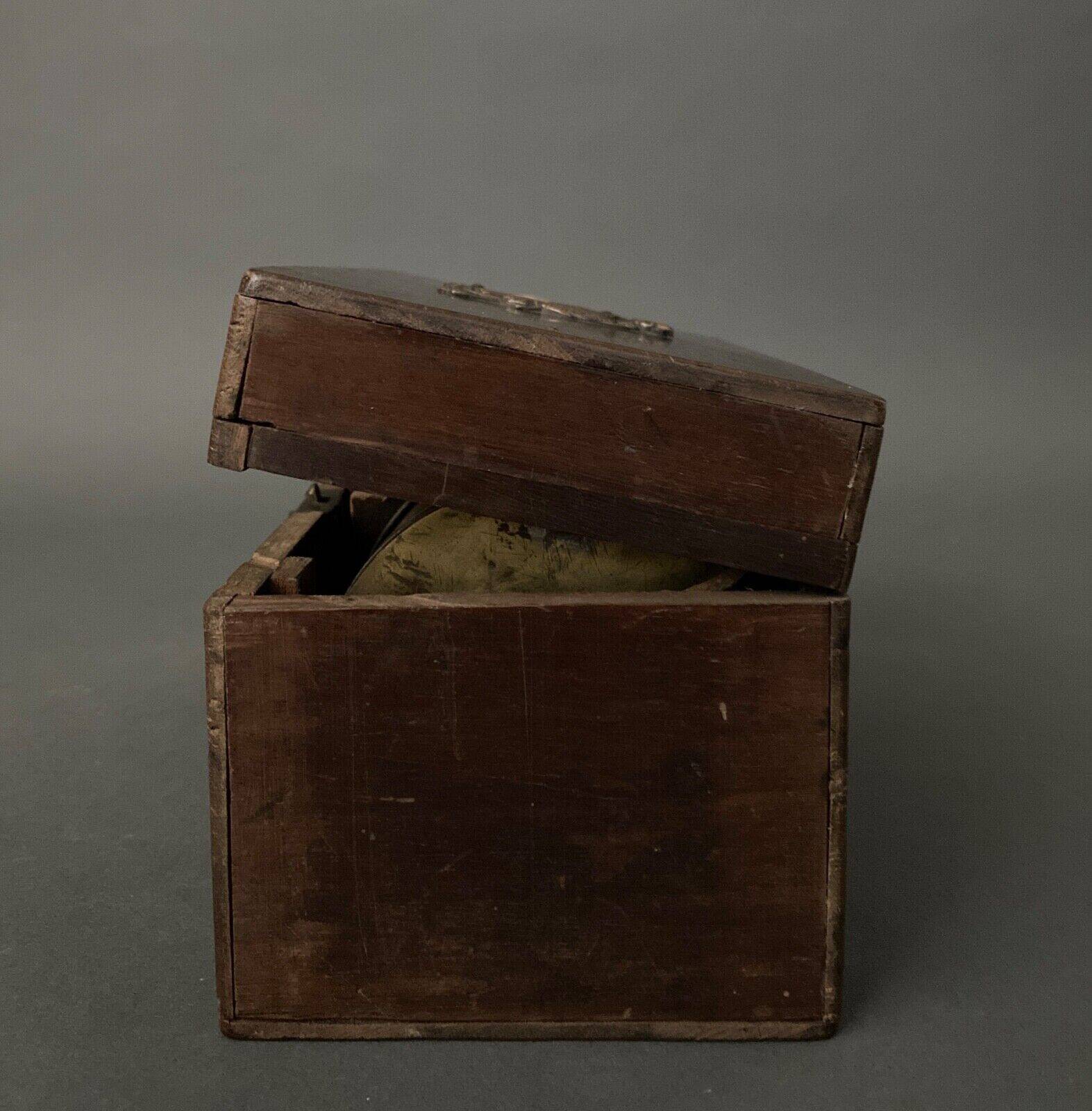 Two reel spools in their original 1900 box