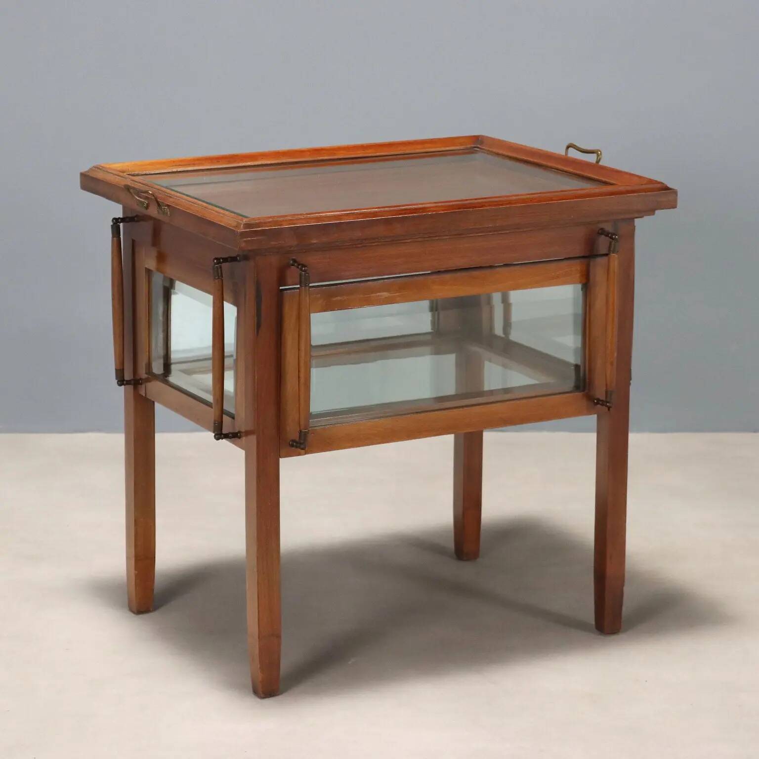 Antique display table in mahogany, glass and bronze, Italy, 19th century.