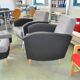 Vintage 1960 set of 4 armchairs and ottomans in grey fabric and black faux leather.