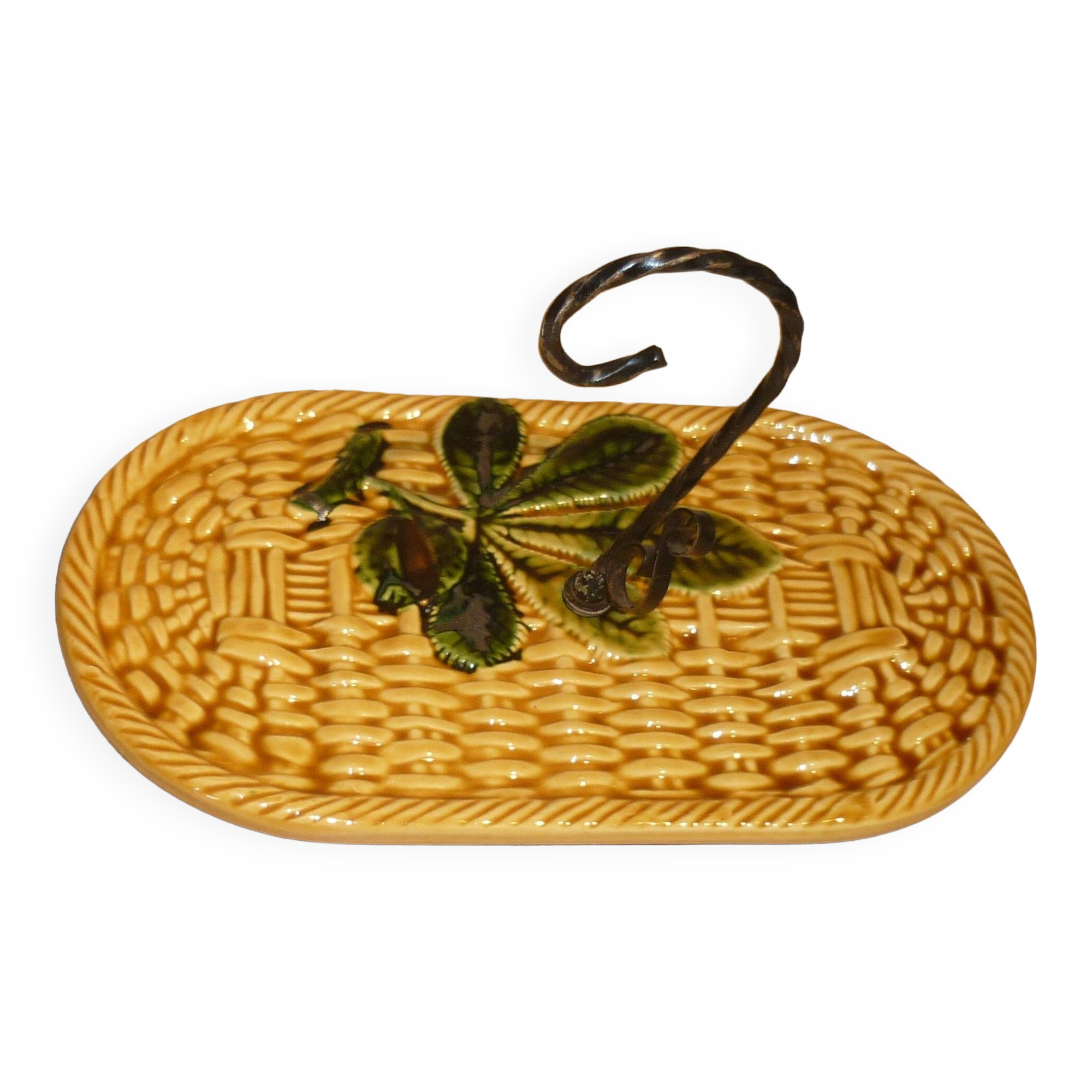 Braided yellow cheese platter and wrought iron