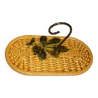 Braided yellow cheese platter and wrought iron