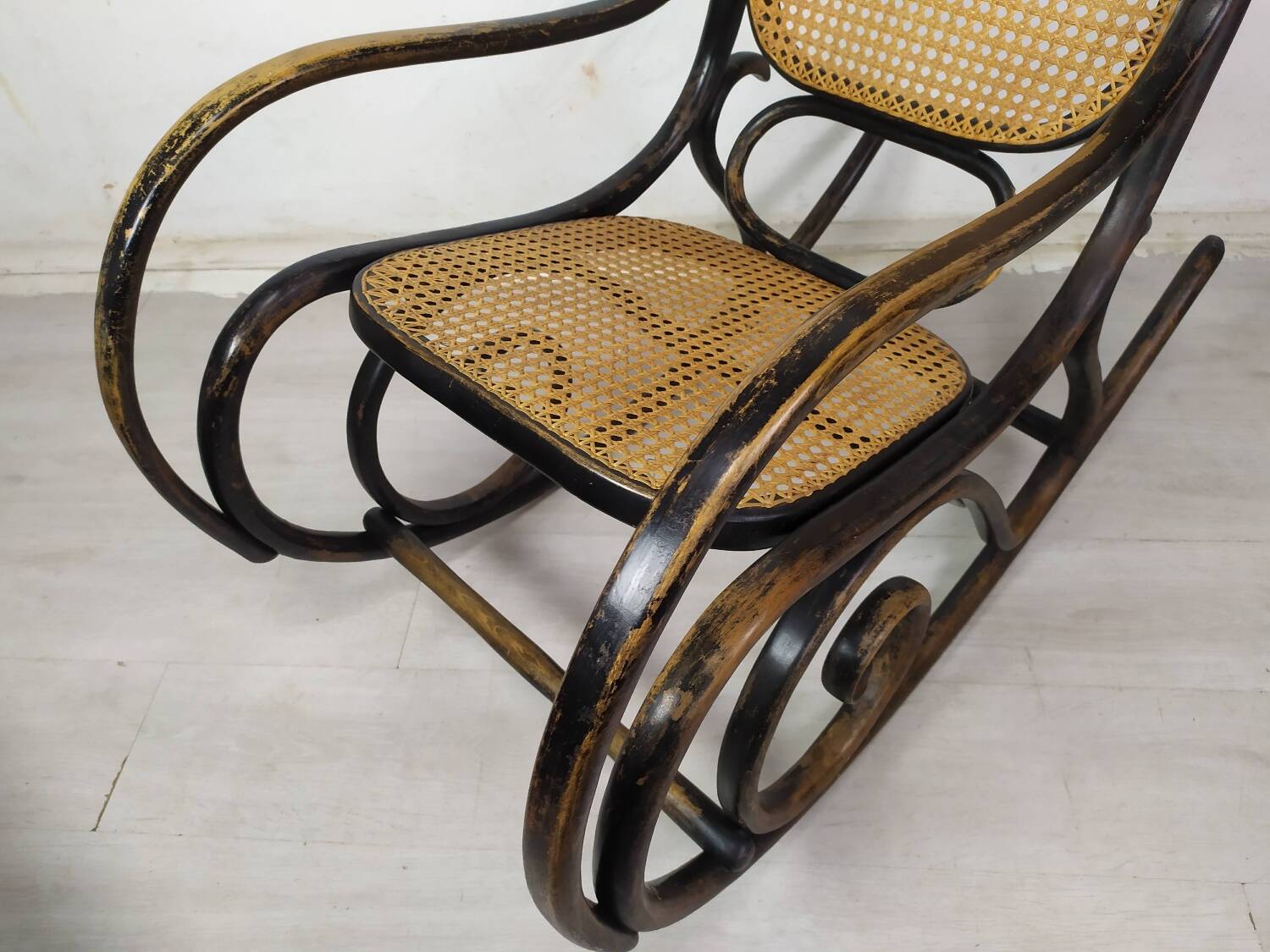 Black curved wood rocking chair