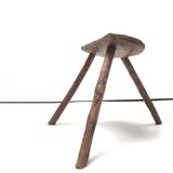 Brutalist tripod stool in solid wood half round