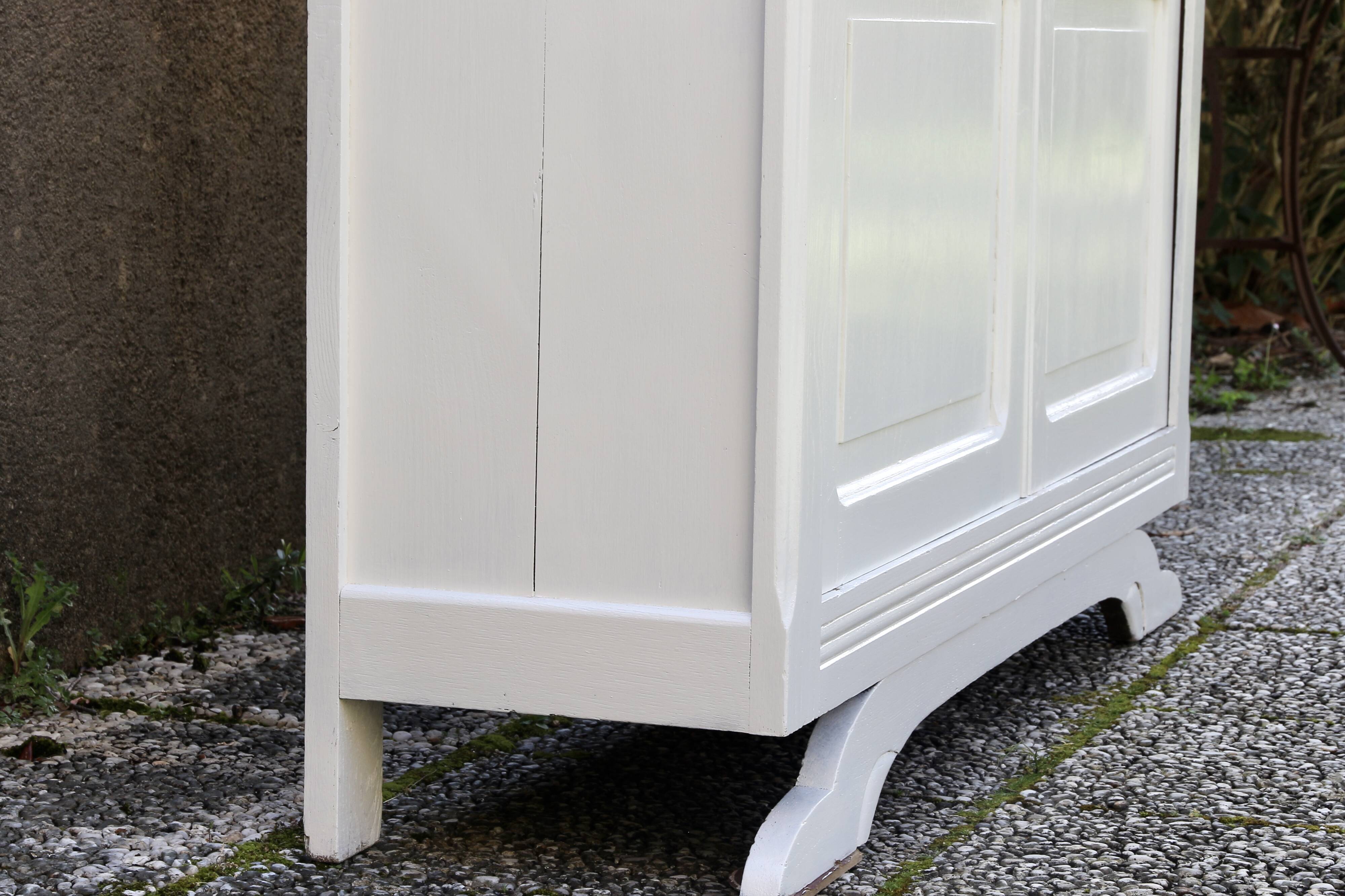 Vintage glass-fronted Parisian wardrobe