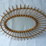 Vintage oval mirror in rattan