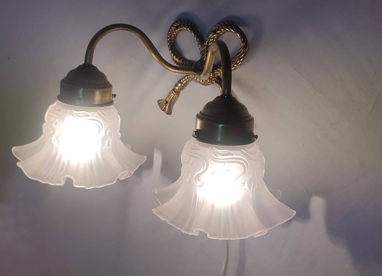 Bronze and crystal wall light. France, 1950s.