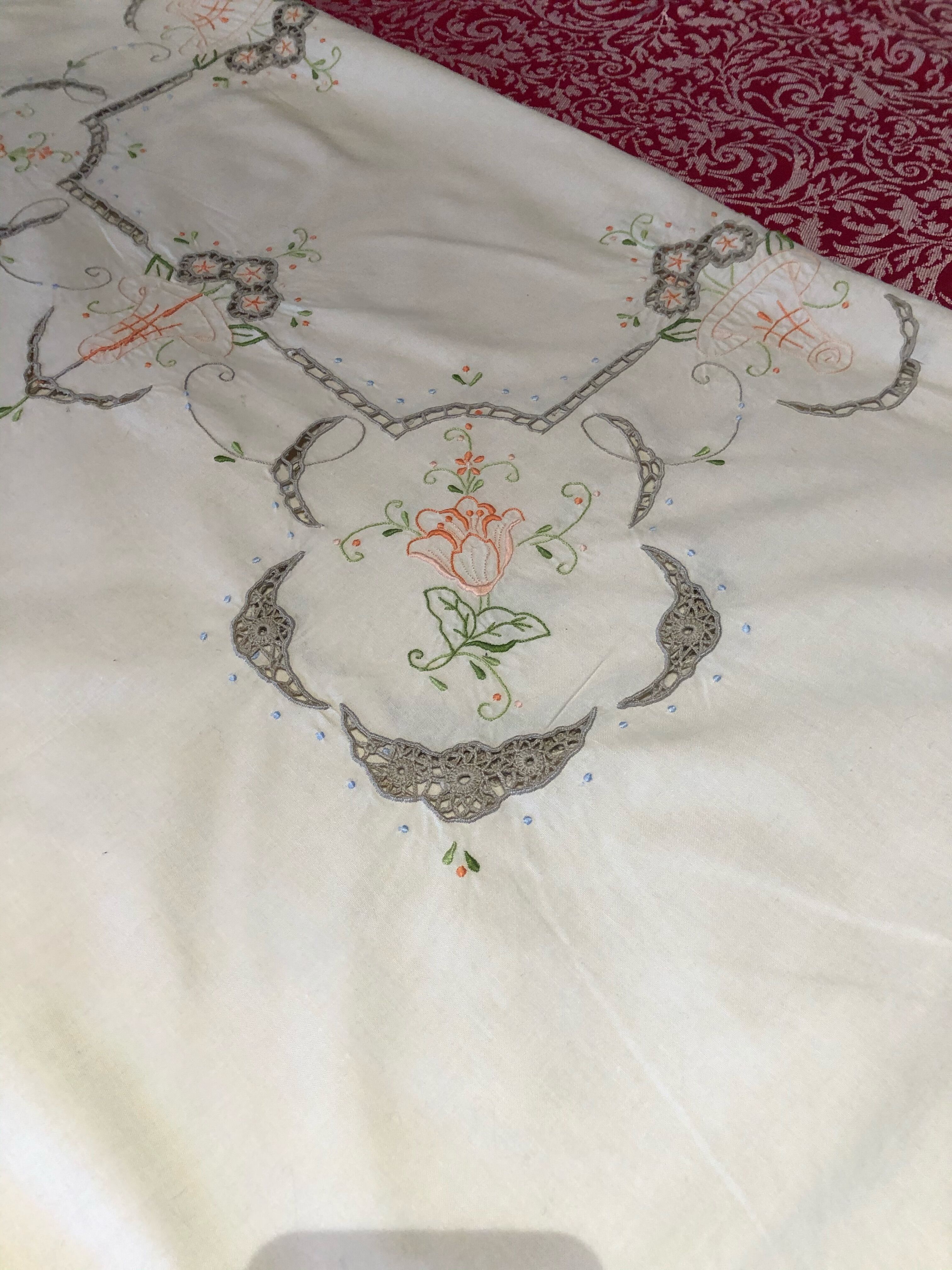 Hand embroidered coat ofkin and old guipure lace