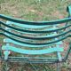 Pair of mid century distressed painted iron garden chairs