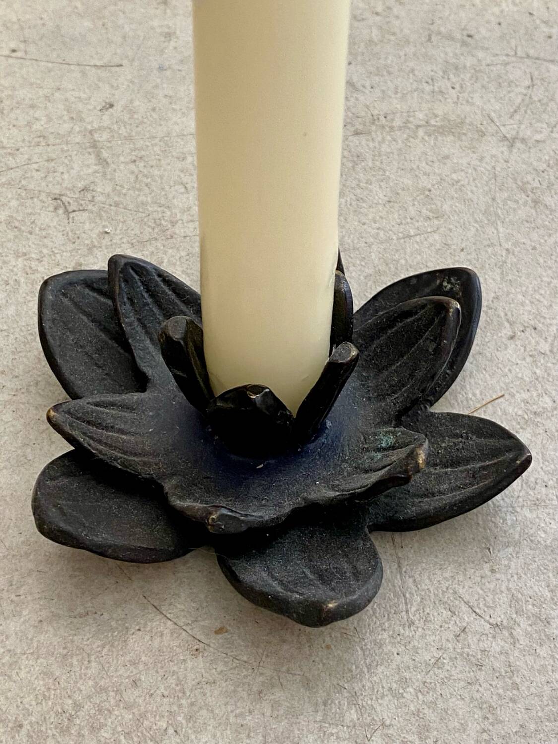 Cast iron candle holder