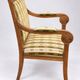 Antique armchair with wooden crossbars – Restoration style