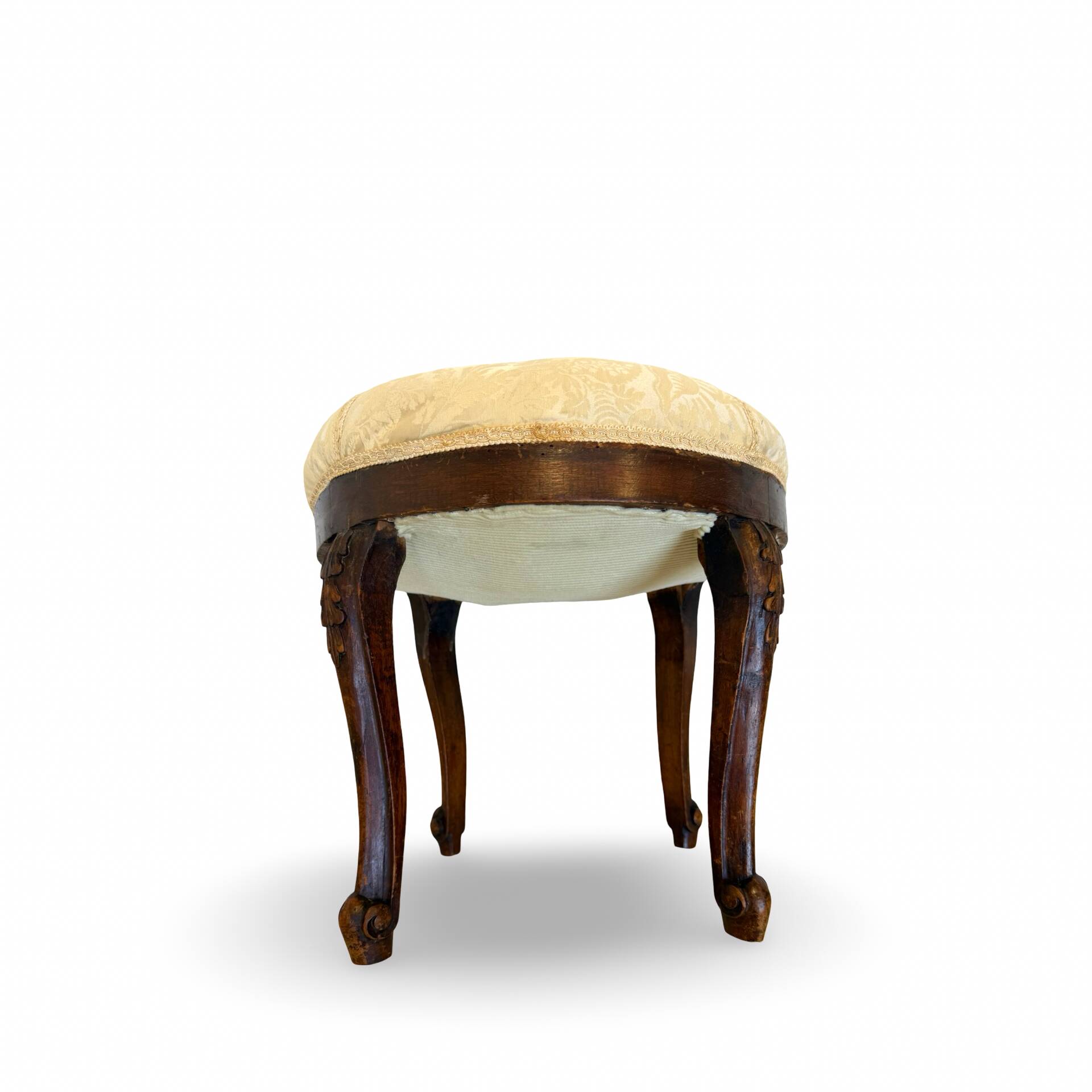 An antique Italian bar chair and a matching tufted vanity stool.