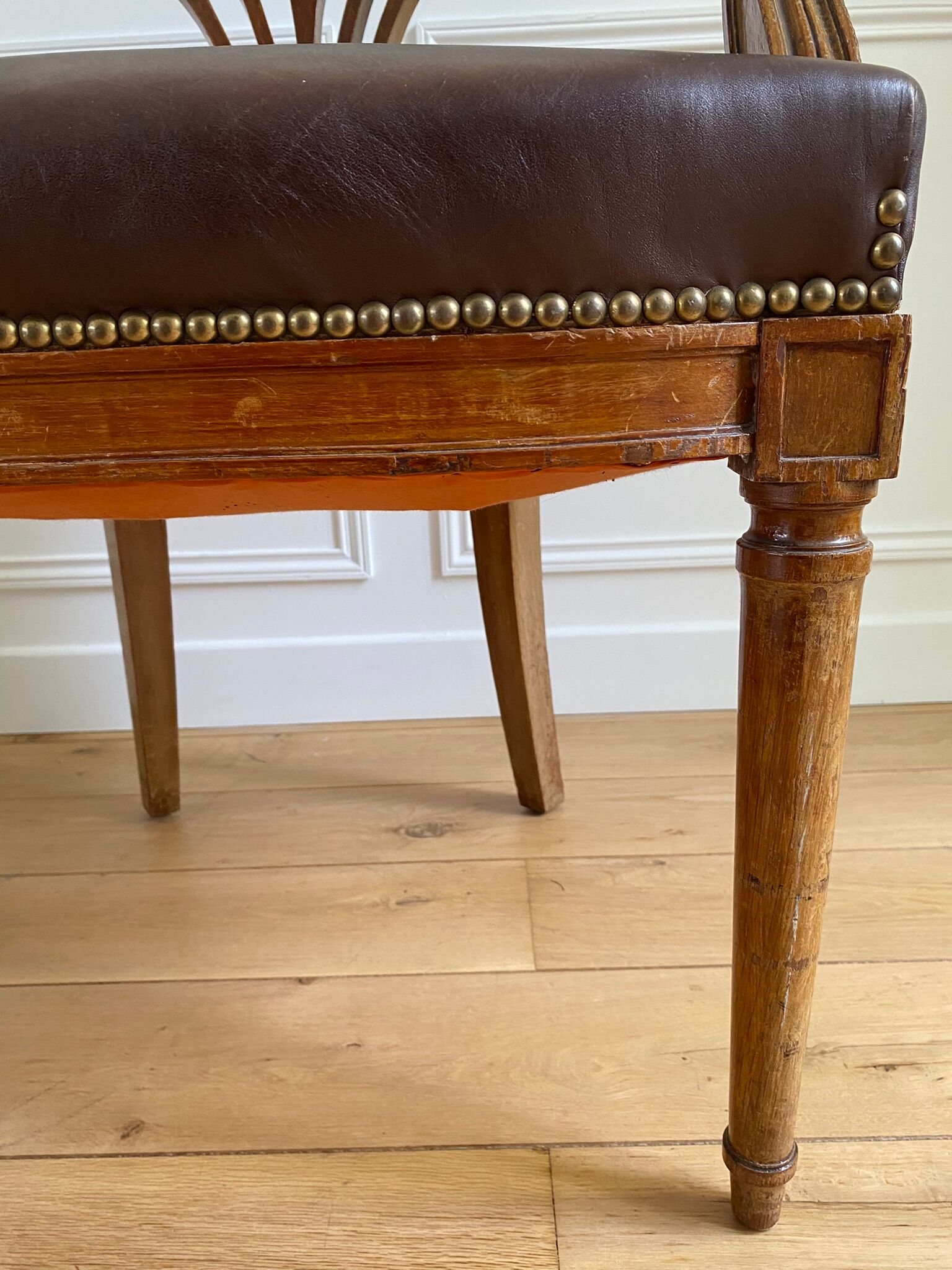 Vintage office chair in wood and brown studded leather late nineteenth
