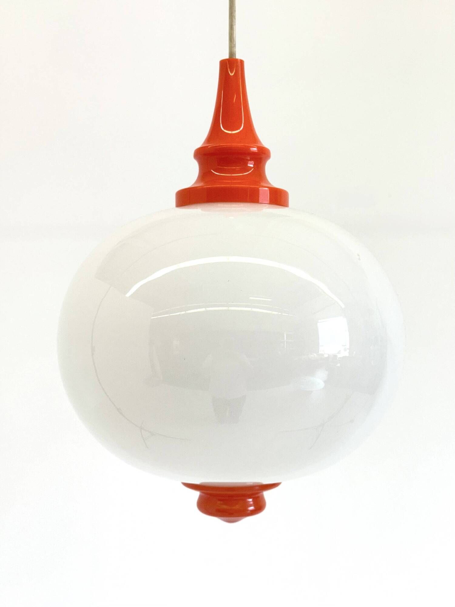 Space Age pendant lamp with milk glass ball and orange accents