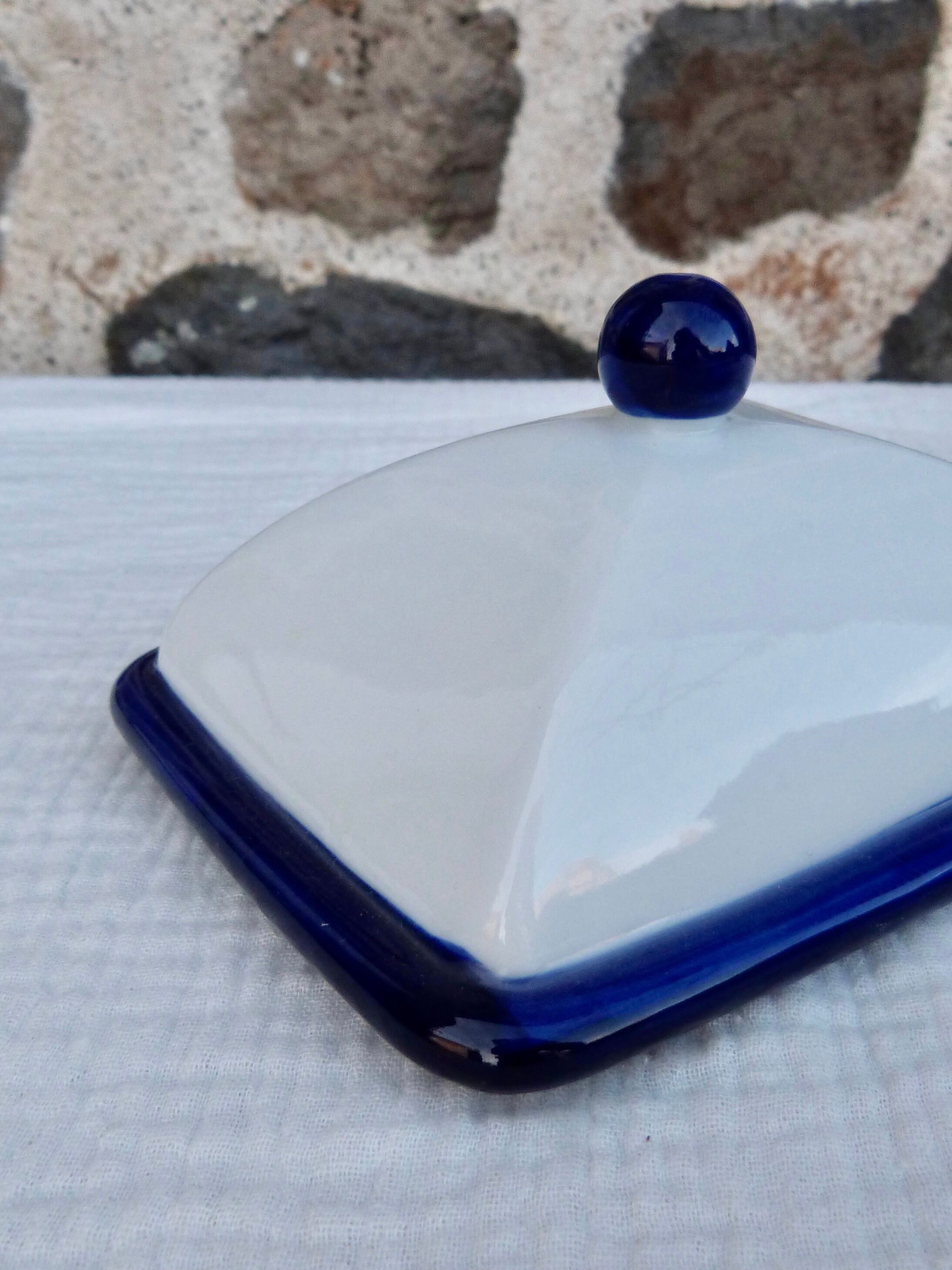 White and blue ceramic butter dish