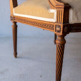 Antique armchair in solid wood