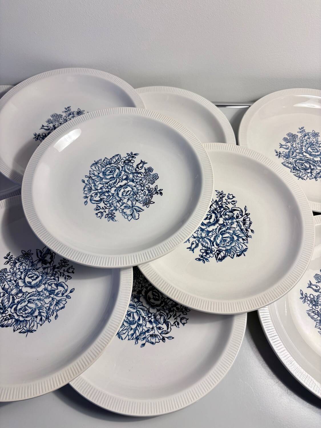 Set of 10 antique Lunéville flat plates – blue floral decoration