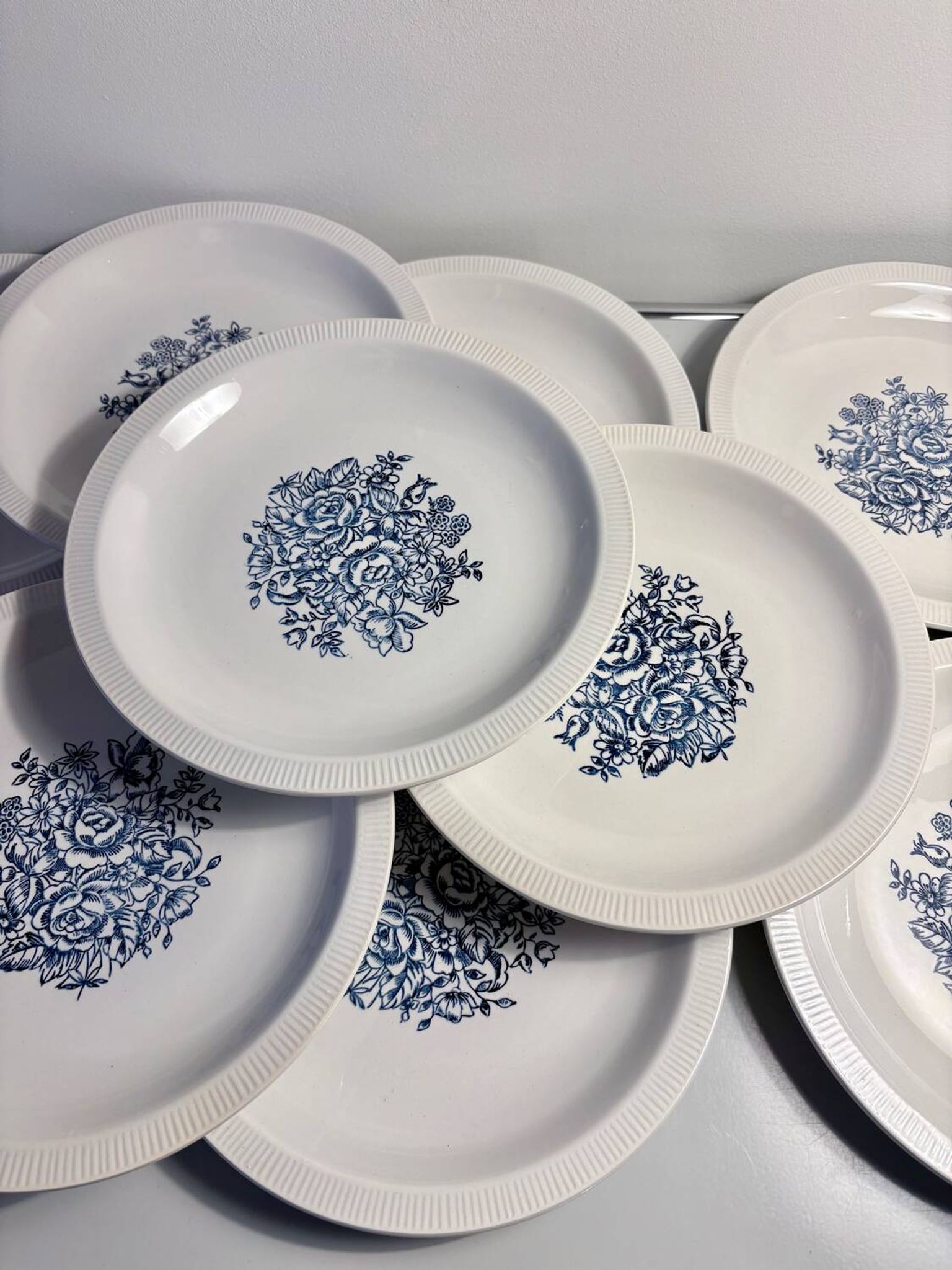 Set of 10 antique Lunéville flat plates – blue floral decoration